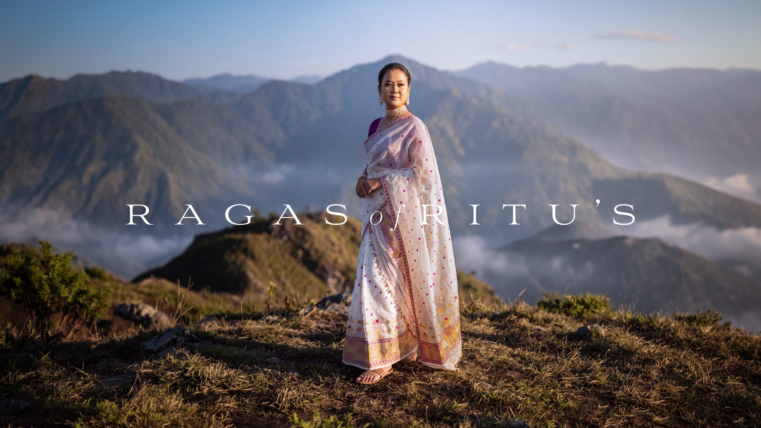 Ragas of Ritu's — white Paat saree with gold border on the hilltop